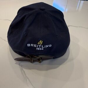 Breitling Dark Blue Cap with Yellow Logo